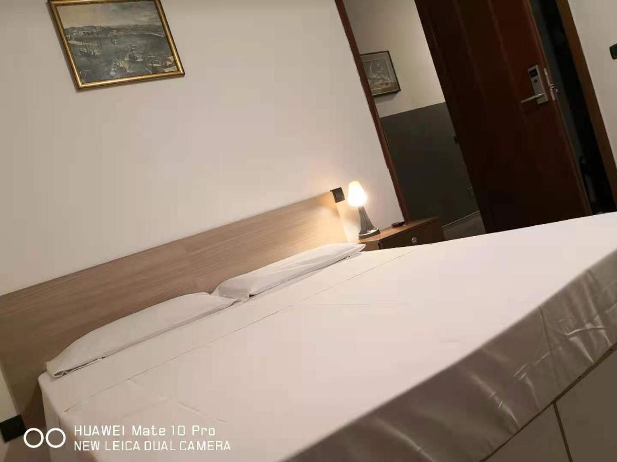 New Family Inn Pero Bagian luar foto
